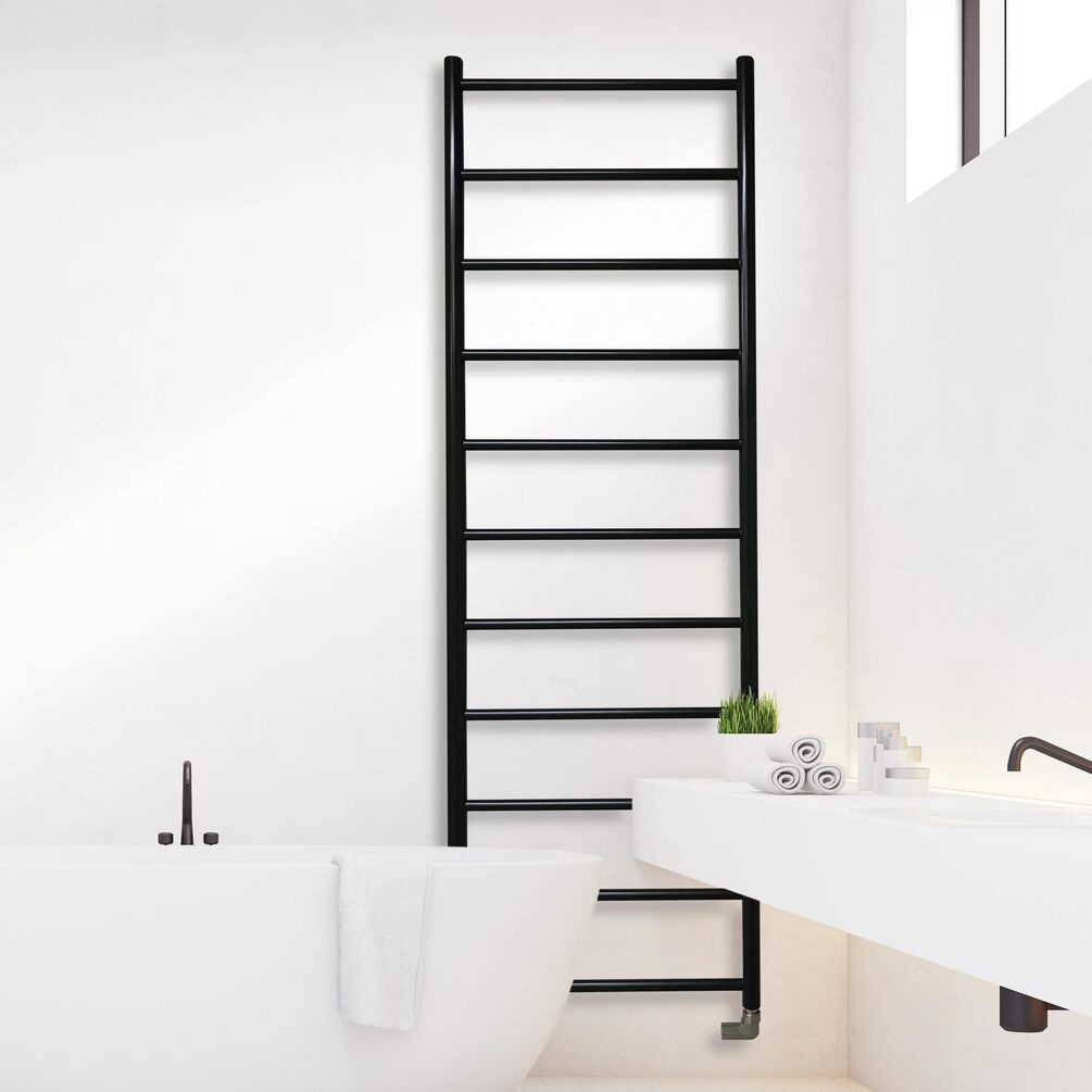 Lifestyle image of the The Sussex Range by JIS Ardingly 1580mm x 520mm Black Heated Towel Rail installed next to a bathtub and wall-hung basin